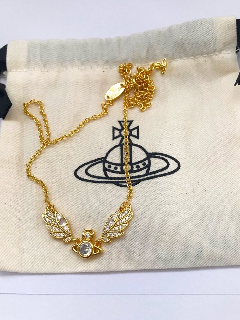 Vivienne Westwood Gold Tone Wing Orb Pendant Necklace